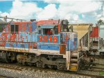 FXE C30-7 Locomotive in the yard with faded paint scheme